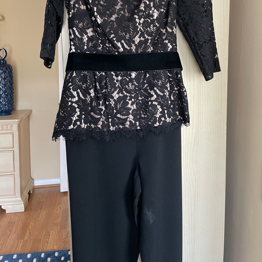 Eliza holiday jumpsuit worn once black/nude lace top velvet belt crepe bottom.